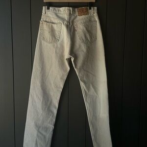 Vintage Levi’s 501 ( tagged 34x34 ) 
MADE IN USA 
gorgeous beige sand color.